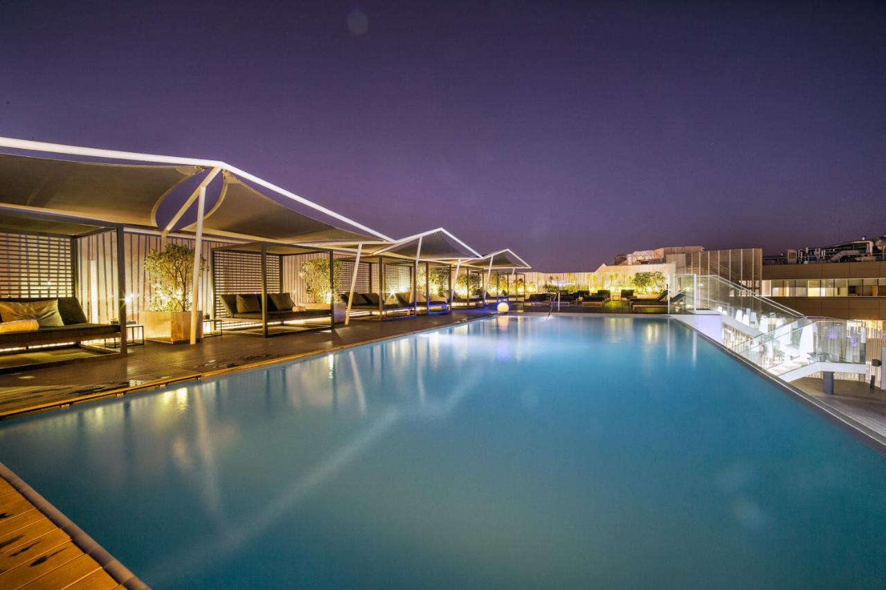Epic Sana Lisboa Hotel Exterior foto The swimming pool at the hotel