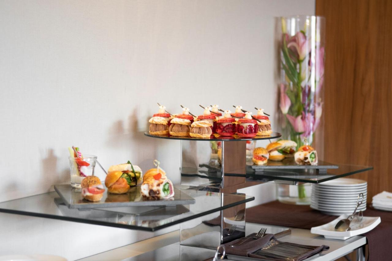 Epic Sana Lisboa Hotel Exterior foto Finger food