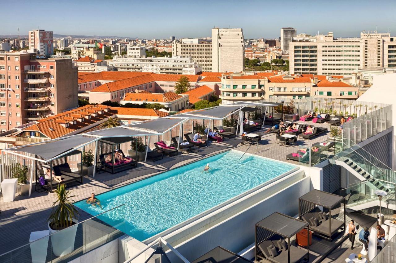 Epic Sana Lisboa Hotel Exterior foto The rooftop pool at the Hilton Athens