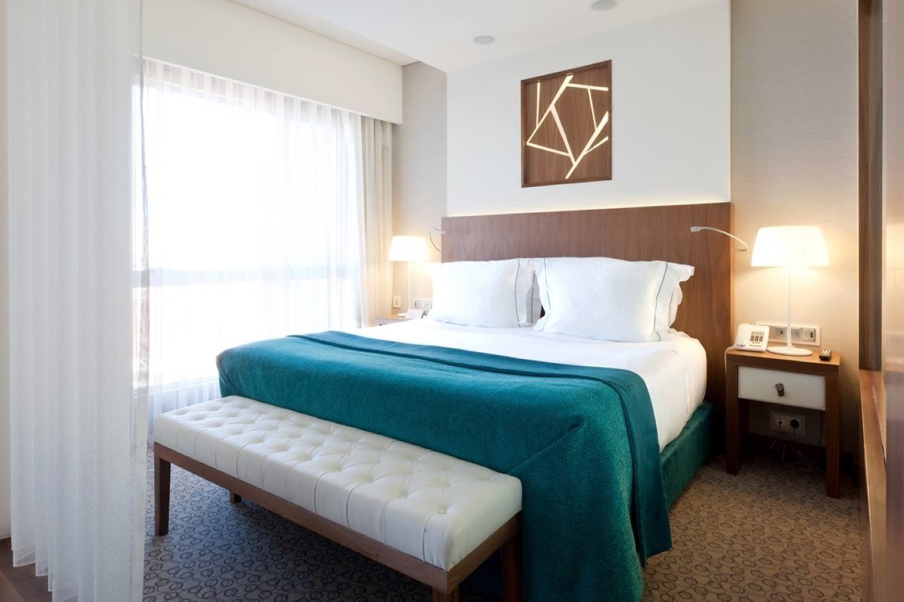 Epic Sana Lisboa Hotel Exterior foto A bedroom at the hotel
